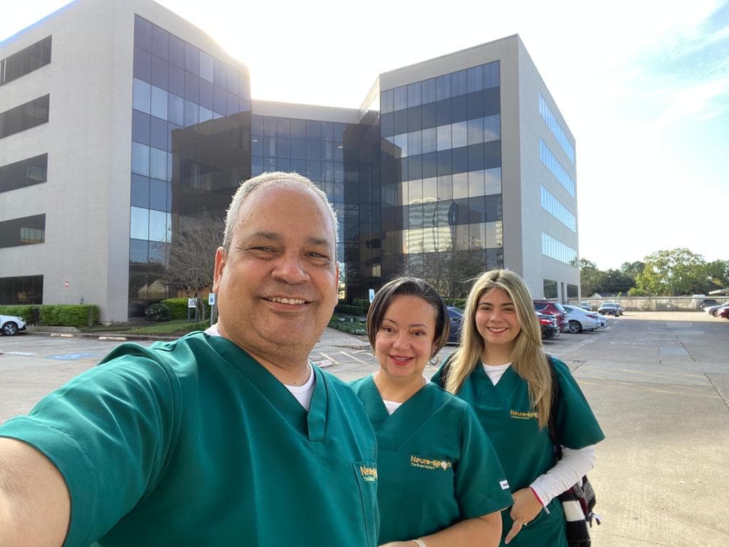 NeuroSports USA team outside the Houston center at 11777 Katy Freeway.